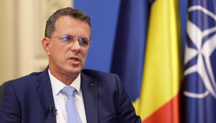  Romania’s Defense Minister Resigns Over Misleading CV Details